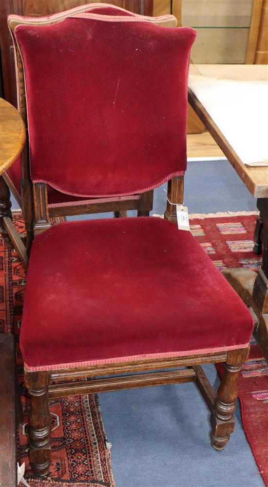 A set of six oak red velvet upholstered chairs